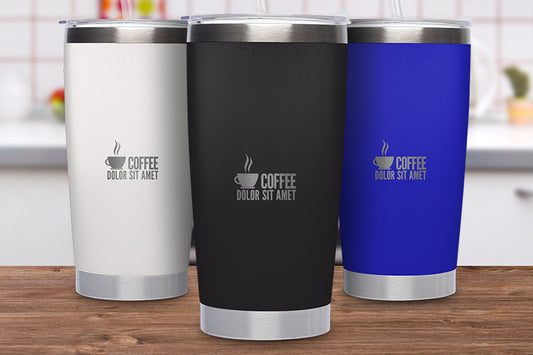 Three insulated tumblers in white, black, and blue with coffee-themed design on a wooden surface.